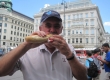Tim eating bratwurst